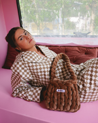 Model wearing The Mae Bag Brown crochet handbag by Dazzled